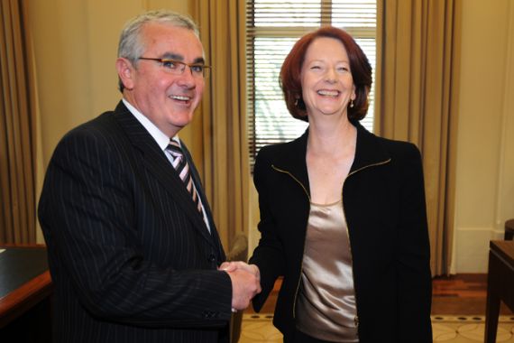 Julia Gillard greets Tasmanian Independent Member of Parliament Andrew Wilkie