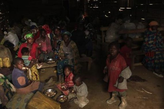 Families who fled from renewed fighting seek shelter in a church in the eastern Congolese town of Rumangabo