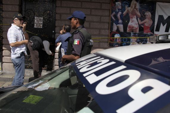 Policemen Mexico strip bar Monterrey