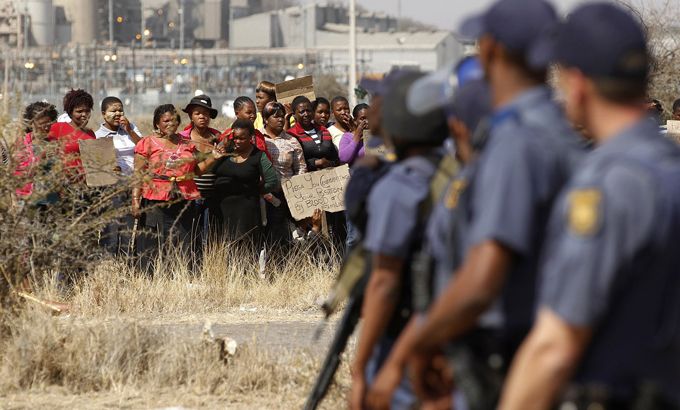 Women in South Africa protest against killing of miners by police