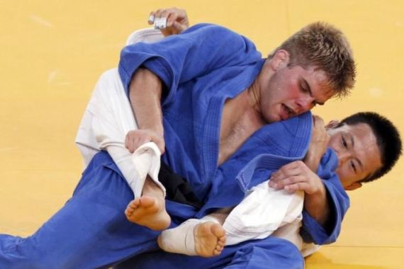 File photo of Nicholas Delpopolo of the U.S. fighting with South Korea''s Wang Ki-Chun during the men''s -73kg quarter-final judo match at the London 2012 Olympic Games