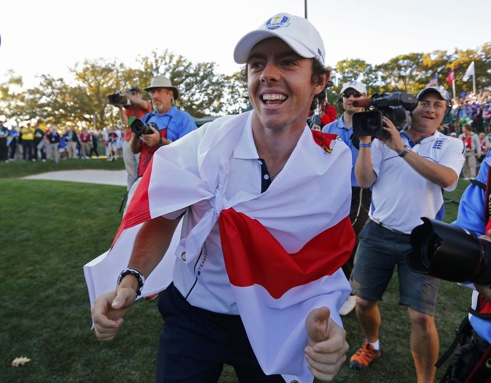 Team Europe golfer McIlroy celebrates winning the Ryder Cup during the 39th Ryder Cup singles golf matches at the Medinah Country Club