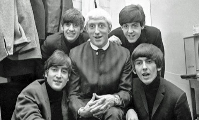 Jimmy Savile with the Beatles