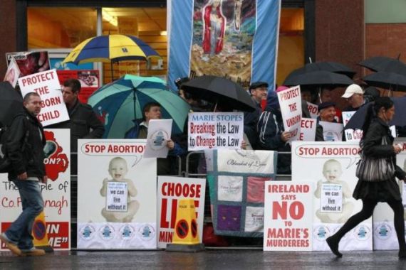 Pro-life campaigners protest outside the Marie Stopes clinic in Belfast