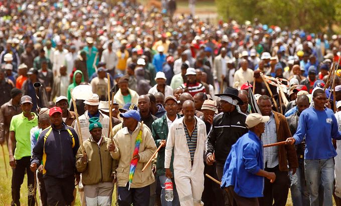 Striking miners gather in Carletonville, South Africa