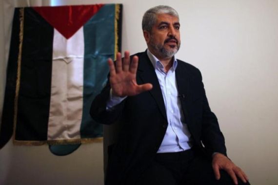 Hamas leader Khaled Meshaal talks during his interview with Reuters in Doha