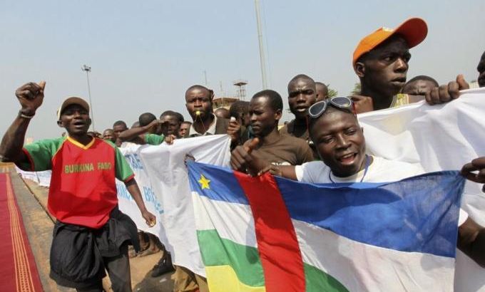 Supporters of Central African Republic President Francois Bozize demonstrate at the airport in Bangui