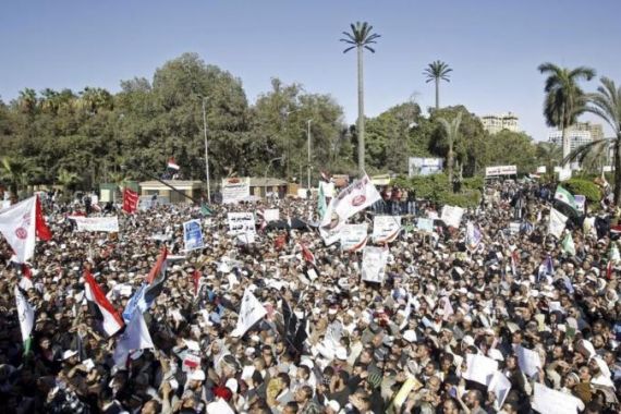 Demonstrators, who support Islamic Jama''a and Muslim Brotherhood, chant slogans in support of Egypt''s President Mursi and Islamic Shari''a in Cairo
