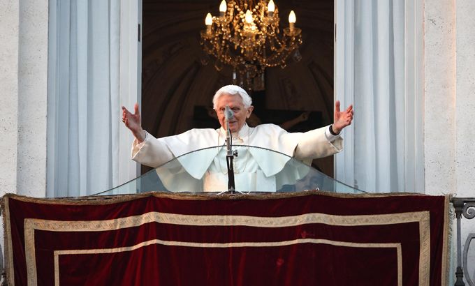 Pope Benedict XVI waves to the faithful
