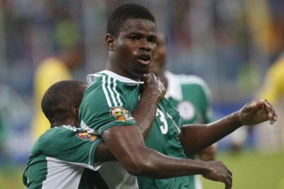 Nigeria''s Echiejile is congratulated by teammate Mba after he scored his goal against Mali during their African Cup of Nations semi-final soccer match in Durban