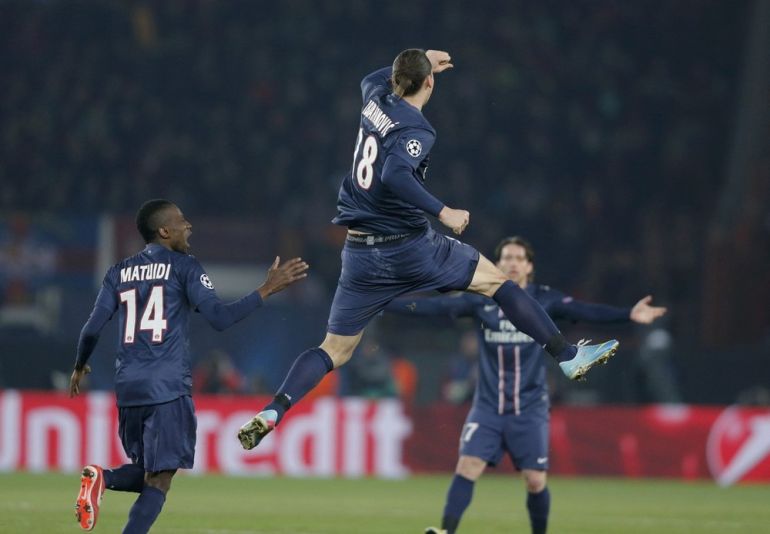Paris St Germain''s Ibrahimovic celebrates with Matuidi after scoring against Barcelona during their Champions League quarter-final first leg soccer match at the Parc des Princes Stadium in Paris