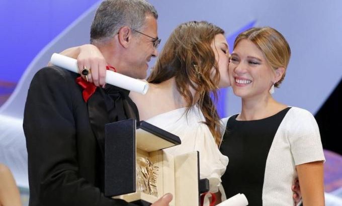Director Abdellatif Kechiche, actresses Lea Seydoux and Adele Exarchopoulos, react on stage after receiving the Palme d''Or award during the closing ceremony of the 66th Cannes Film Festival