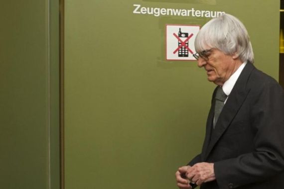 F1 supremo Bernie Ecclestone arrives to testify in the trial against banker Gerhard Gribkowsky at a district court in Munich