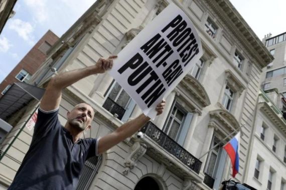 Protestors denounce anti-gay legislation outside Russian Embassy in New York