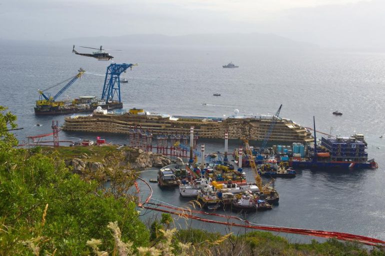 Engineers Attempt To Raise The Costa Concordia Cruise Ship After It Sank In 2012