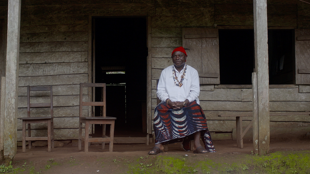 John Ekue, chief of Ikoti village outside Mundemba and in the Herakles Concession area [Hugh Hartford / Al Jazeera]