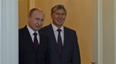 Putin and Kyrgyz President Almazbek Atambayev in the Konstantin Palace outside St. Petersburg, Russia [AP]