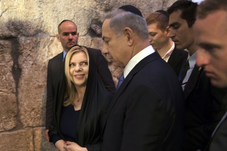 Israel''s Prime Minister Benjamin Netanyahu leaves with his wife Sara after he delivered a statement to the media in Jerusalem''s Old City [REUTERS]