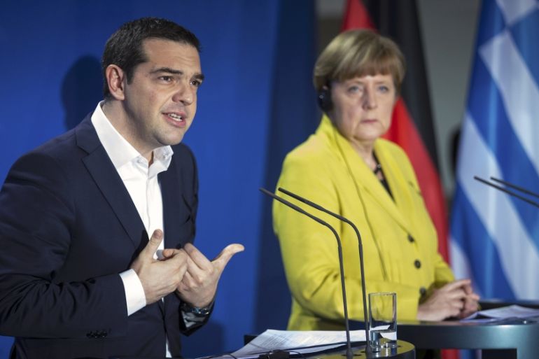 German Chancellor Angela Merkel and Greek Prime Minister Alexis Tsipras address a news conference following talks at the Chancellery in Berlin March 23, 2015.