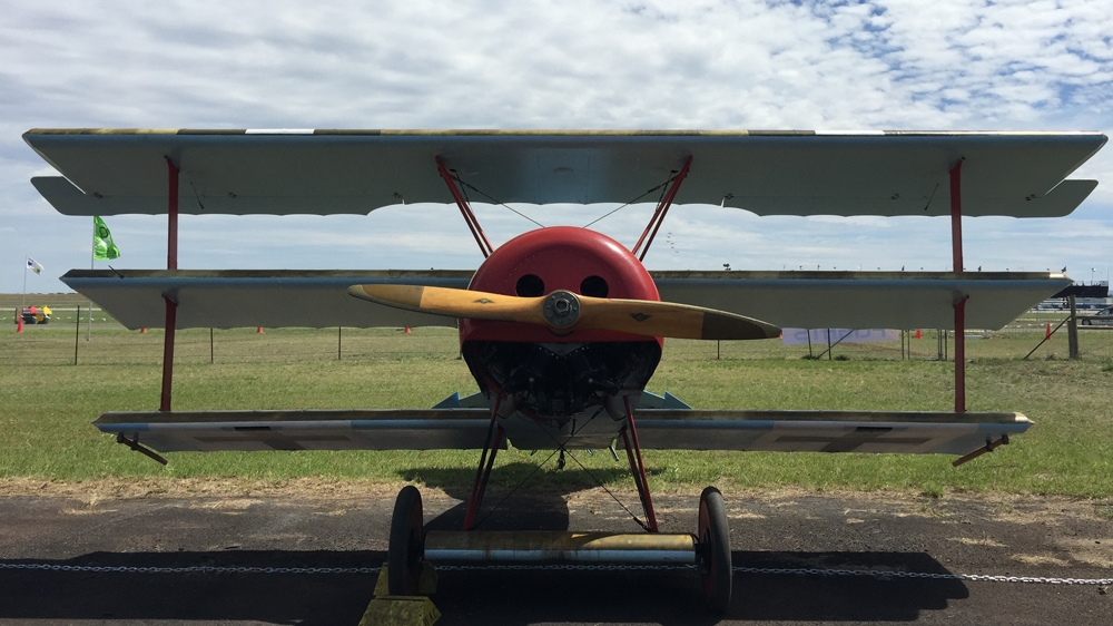 One of the historic planes with its mahogany propeller