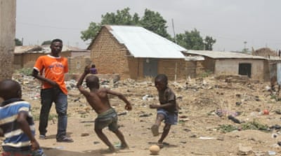 Children in Jos play football in the neighbourhood known as 'Gaza' [Chika Oduah/Al Jazeera]