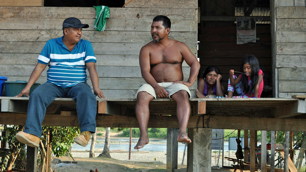 Indigenous leaders Edilberto Dogirama (left) and Edilfonso Ají (right) at Ají's home in Marragantí [Joe Jackson/Al Jazeera]
