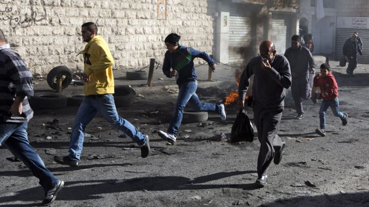 Palestinians in Shuafat Refugee Camp clash with Israeli police after Friday prayers