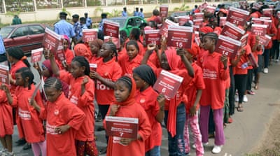 Children under the auspices of Chibok Girls Ambassadors march to press for the release of 219 schoolgirls abducted by Boko Haram at ministry of education in Abuja, on April 14, 2015. [Getty Images]