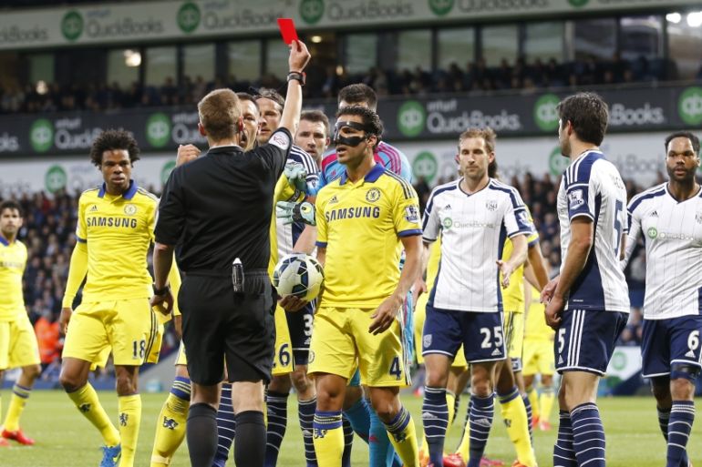 Football: Chelsea''s Cesc Fabregas is shown a red card by referee Mike Jones