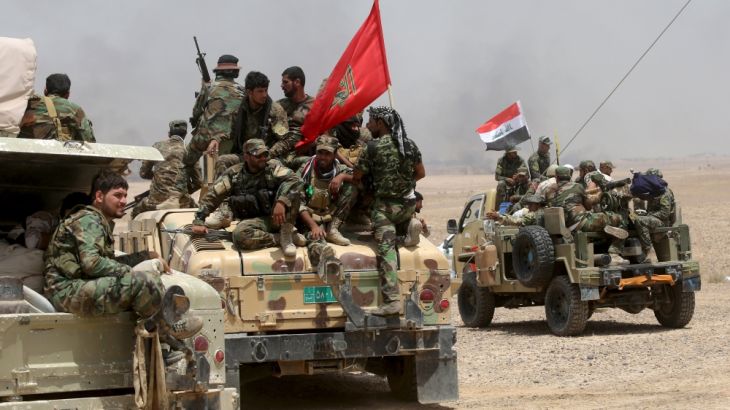Iraq''s Shi''ite paramilitaries and members of Iraqi security forces gather in Nibai, in Anbar province