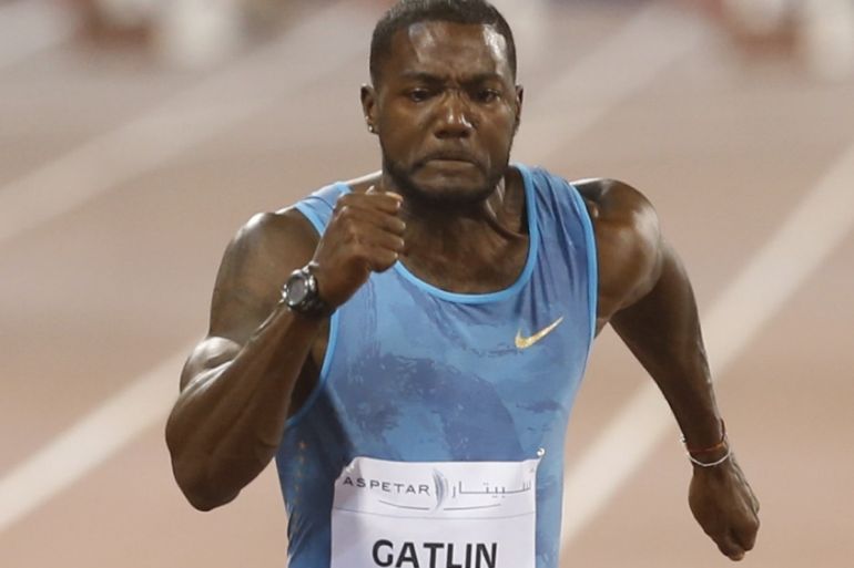 Gatlin from the US competes in the men''s 100 meters event during the Diamond League meeting in Doha