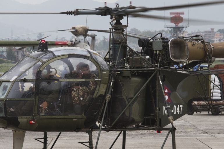 A Nepalese army chopper that spotted the suspected wreckage of a US Marine helicopter