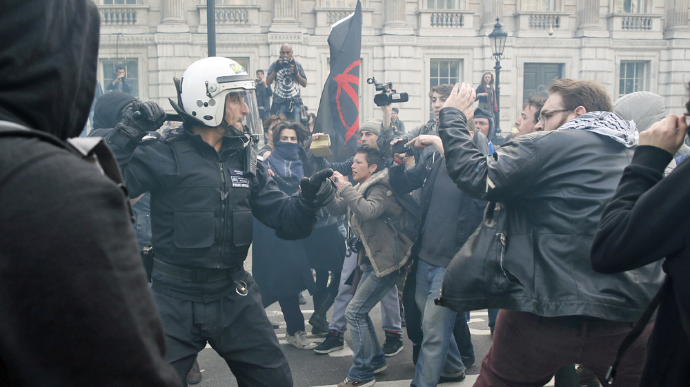 Protesters and police battled at the gates of Downing Street [Reuters]