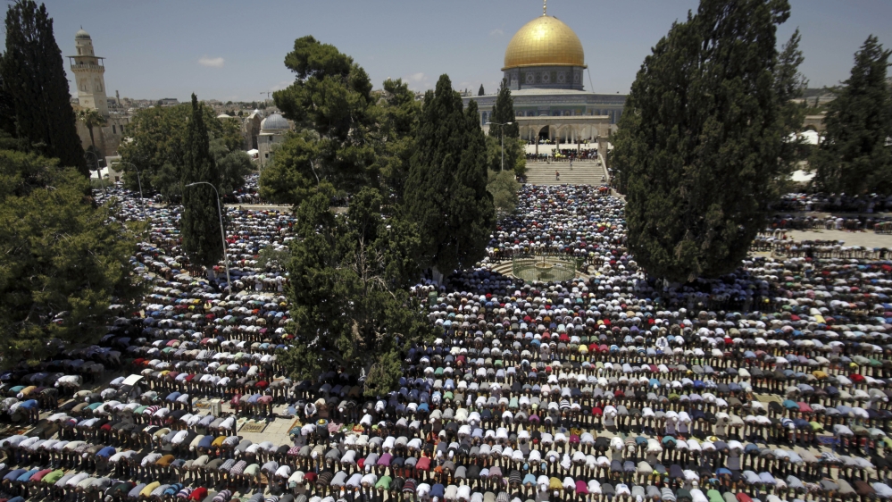 On the first Friday of Ramadan, tens of thousands of Palestinians performed prayers at Al-Aqsa [AP]