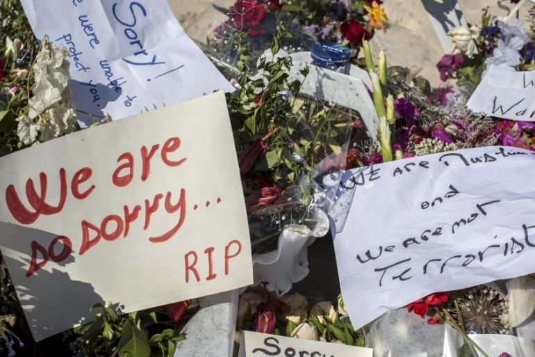 Messages and flowers are placed at the beach of the Imperial Marhaba resort, which was attacked by a gunman in Sousse
