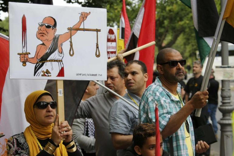 Demonstrators protest against Egypt''s President Abdel Fattah al-Sisi in front of Bellevue presidential palace in Berlin