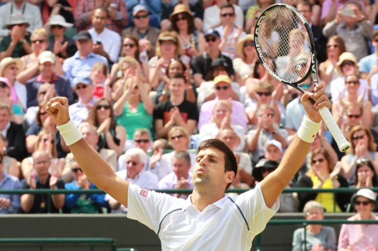 Novak Djokovic celebrates his victory during the Wimbledon Championships in London, in 2015.