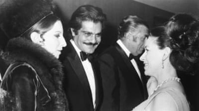 Britain's Princess Margaret talks with Barbra Streisand and Omar Sharif at the premiere of Funny Girl [AP]