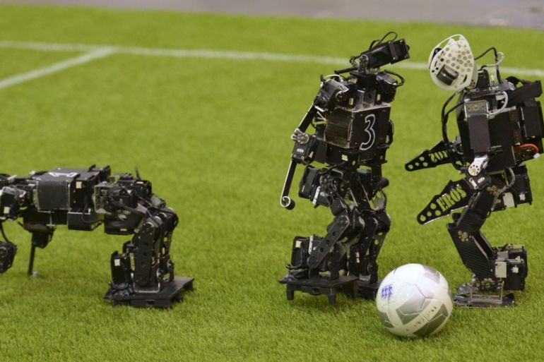 Humanoid robots compete during the 2015 Robocup in Hefei