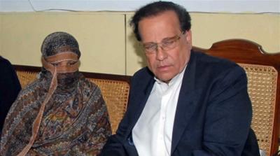 Salman Taseer, right, was killed in 2011 for supporting Asia Bibi, left [File: EPA/Governor House handout]