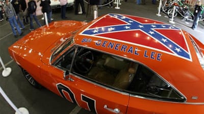 Dukes featured a bright orange 1969 Dodge Charger with the blue stripes crisscrossed on its roof [Getty]