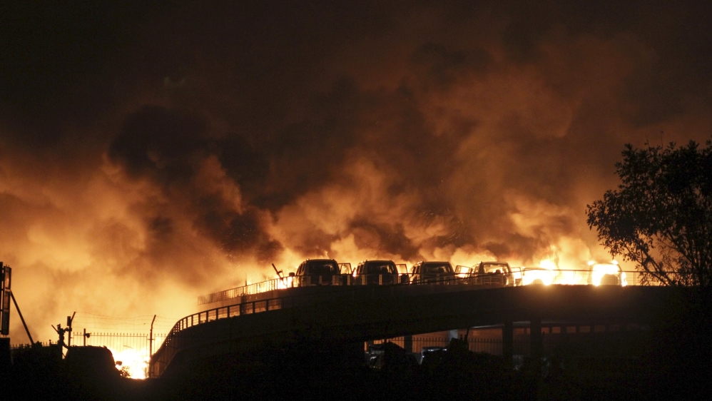 Photos on state media outlets showed a sea of fire that painted Wednesday's night sky bright orange in Tianjin [Reuters]
