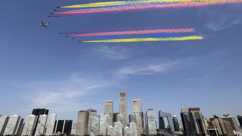 Advanced fighter jets and bombers flew over the parade [Reuters]