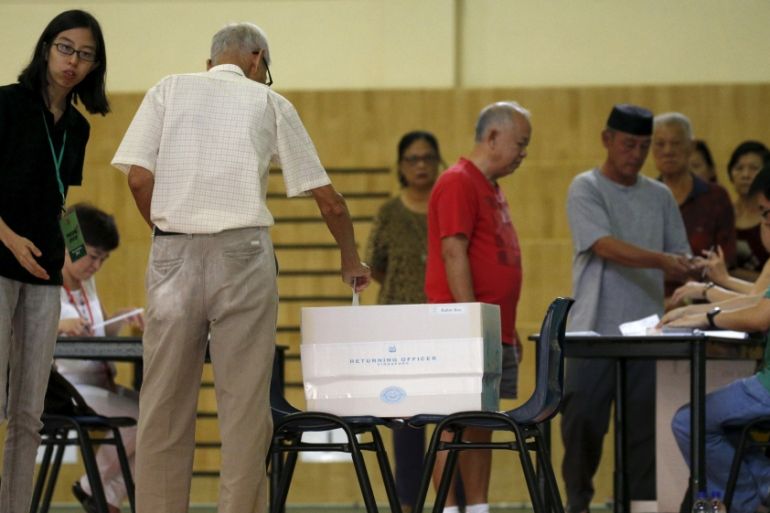 Voters cast their ballots during the general election in Singapore
