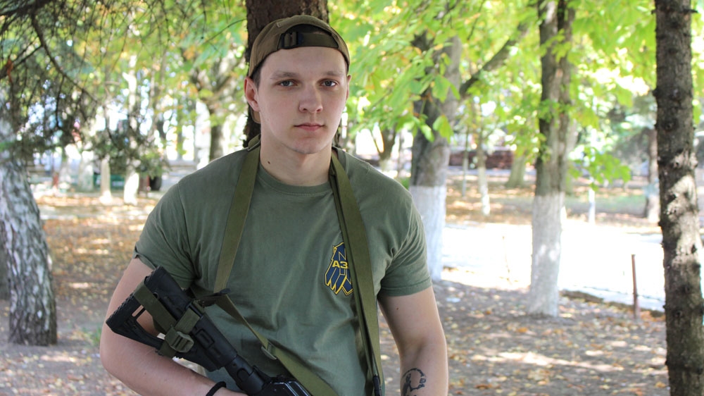 Tweny-one-year-old Arteyom tried to join anti-Putin organisations in Russia but found none. So he came to Ukraine more than a year ago to fight alongside Ukrainian volunteers [Matthew Vickery]  