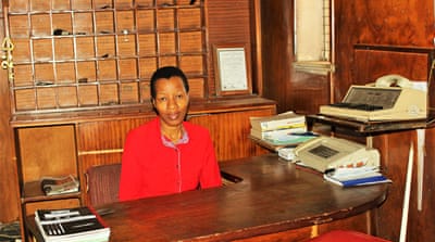 Sithabile Sesedza kept her job but her salary was reduced by 30 percent [Tendai Marima/Al Jazeera]
