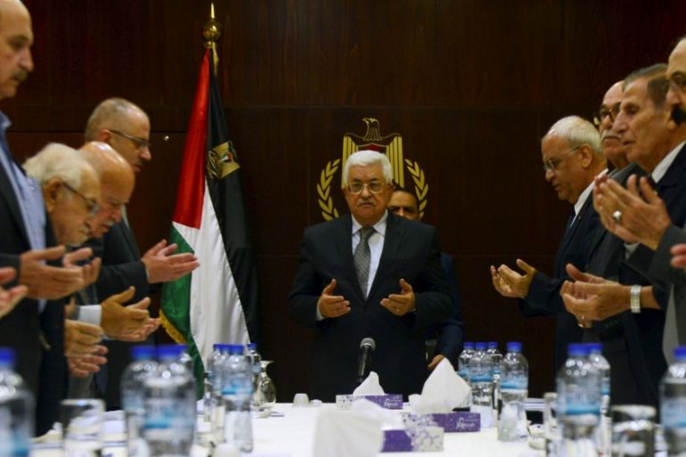Palestinian president Mahmoud Abbas prays at the start of a Palestinian Liberation Organization (PLO) executive committee meeting in the West Bank city of Ramallah
