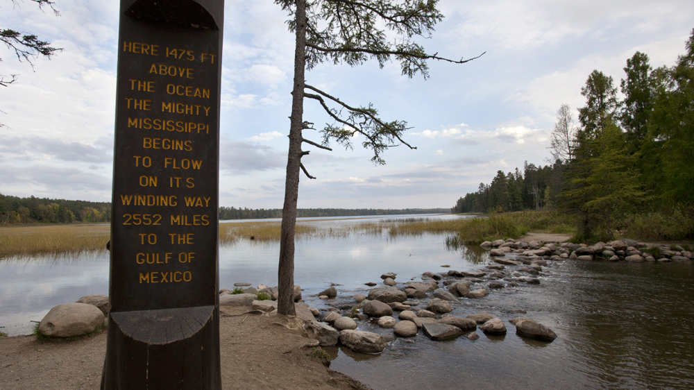 The Headwaters of the Mississippi River flow out of Itasca Lake [Sadie Luetmer/Al Jazeera]