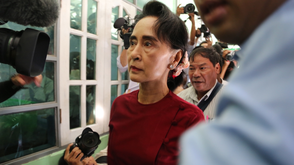 Suu Kyi cast her vote at a polling station in the Bahan township area of Yangon on Sunday [Ted Regencia/Al Jazeera]