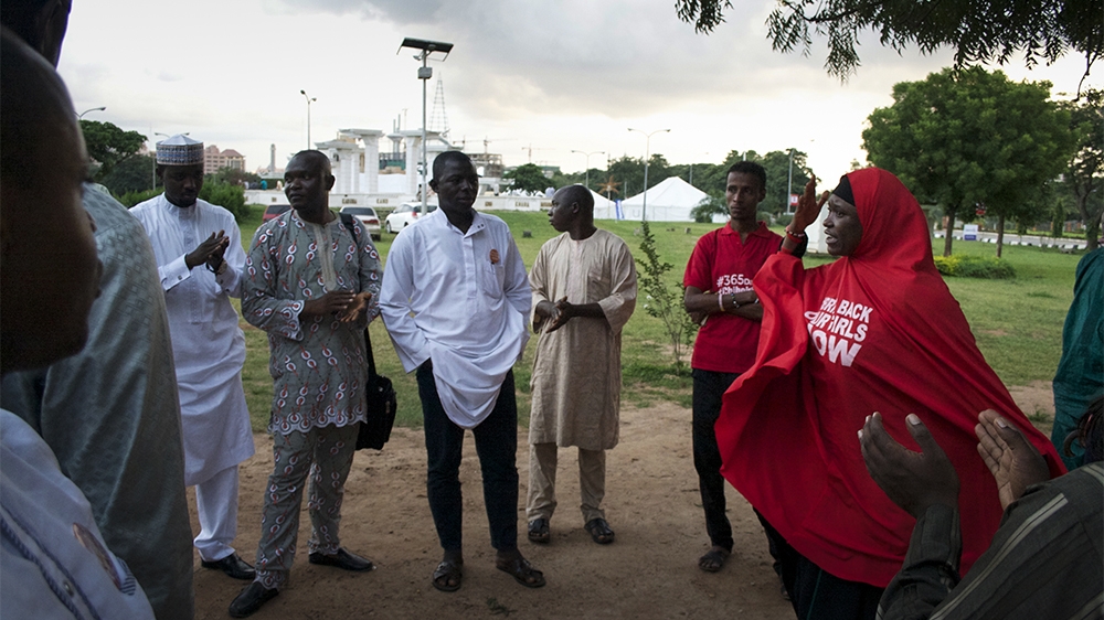 Aisha Yesufu, a Bring Back Our Girls campaigner, speaks at a daily vigil held at the Unity Fountain in Abuja since the kidnapping of the Chibok girls  [Caelainn Hogan/Al Jazeera]